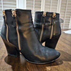 Black leather boots with gold zippers size 8